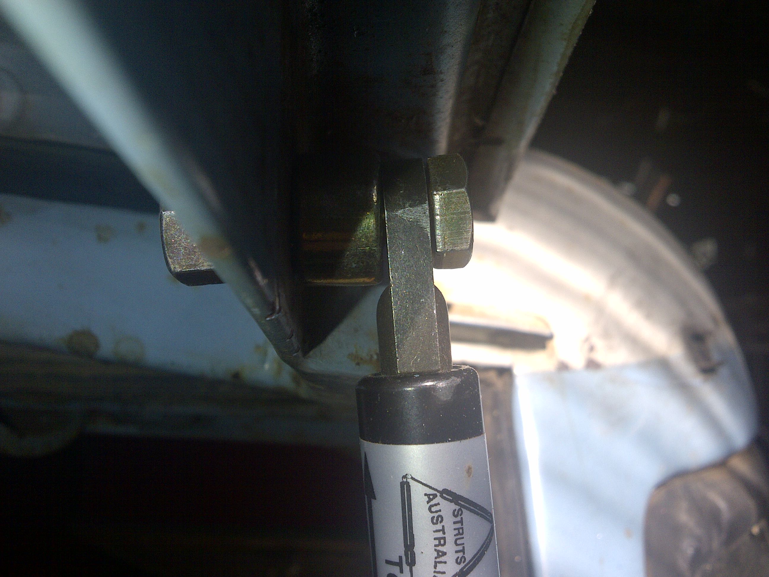 Wagon upper tailgate struts top mount.jpg