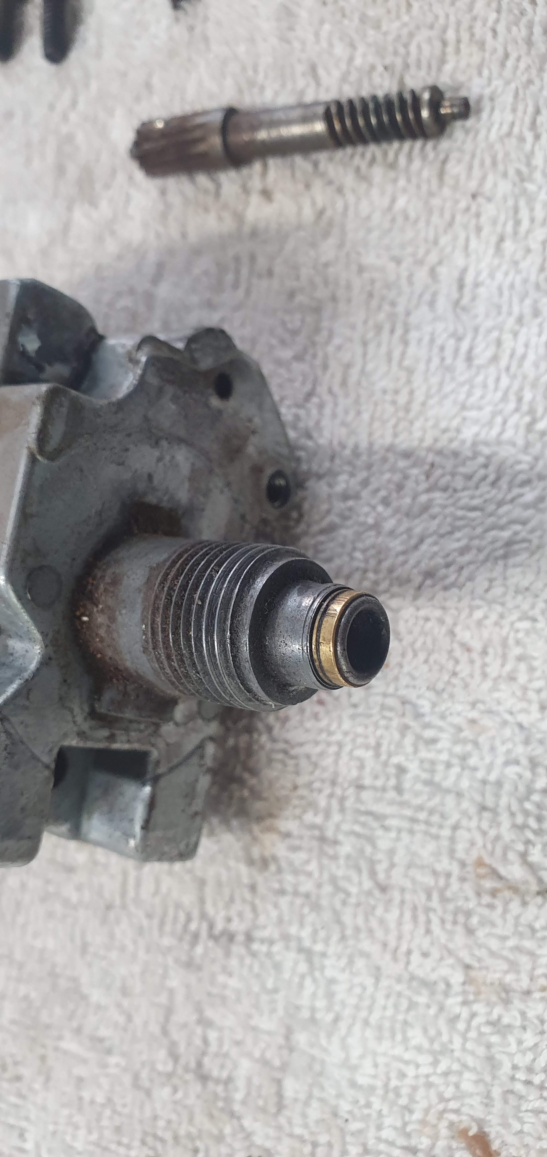 The oddometer drive shaft and cable drive input showing bush