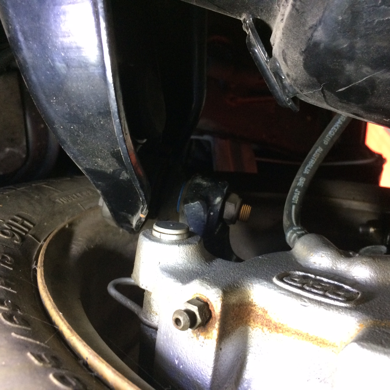caliper hitting top control arm EK.JPG