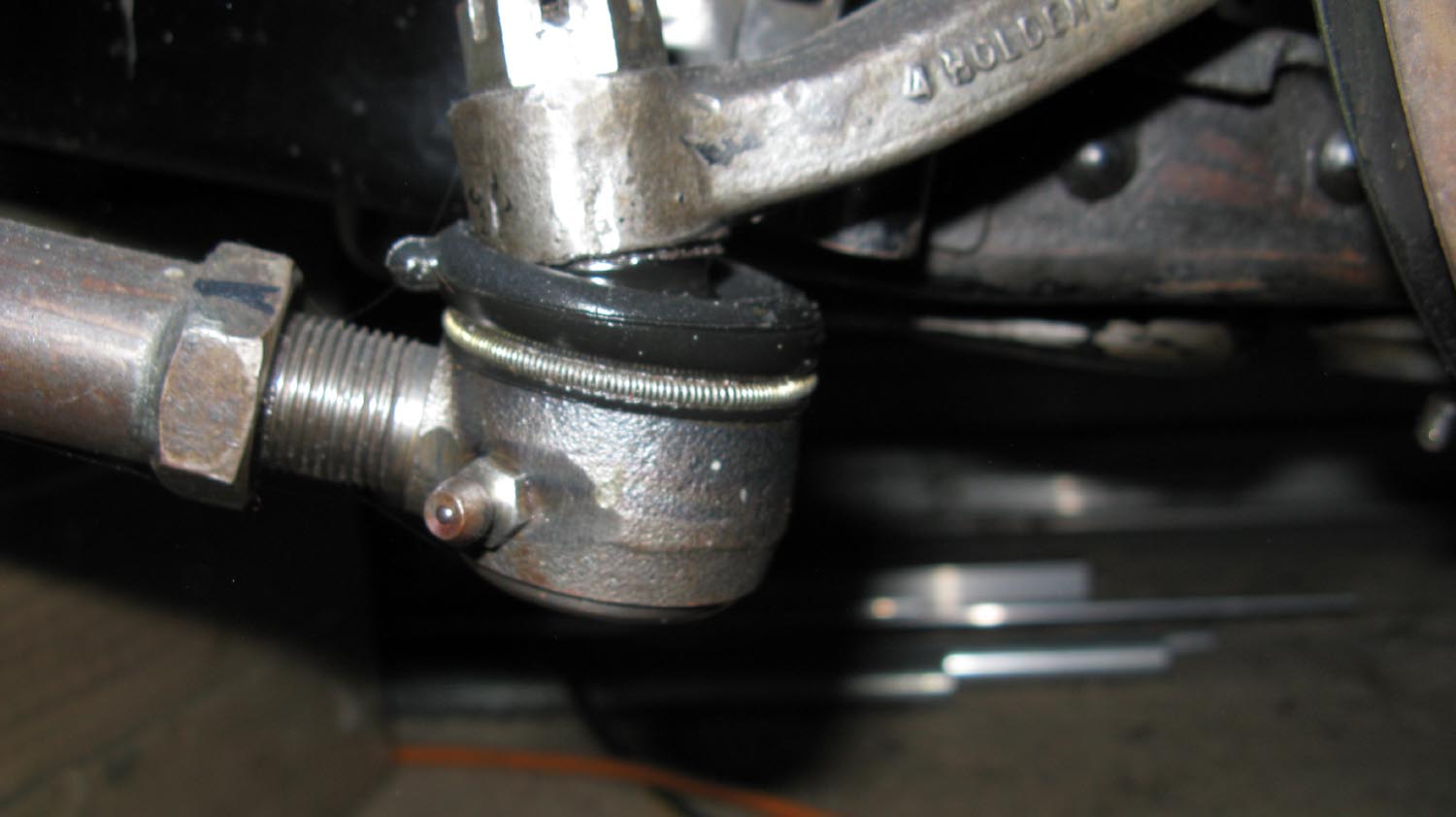 002 steering arm rh lock mail.jpg